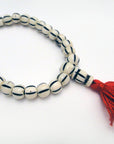 Tika Bracelet Carved Bone Mala Bracelet- Light Striped