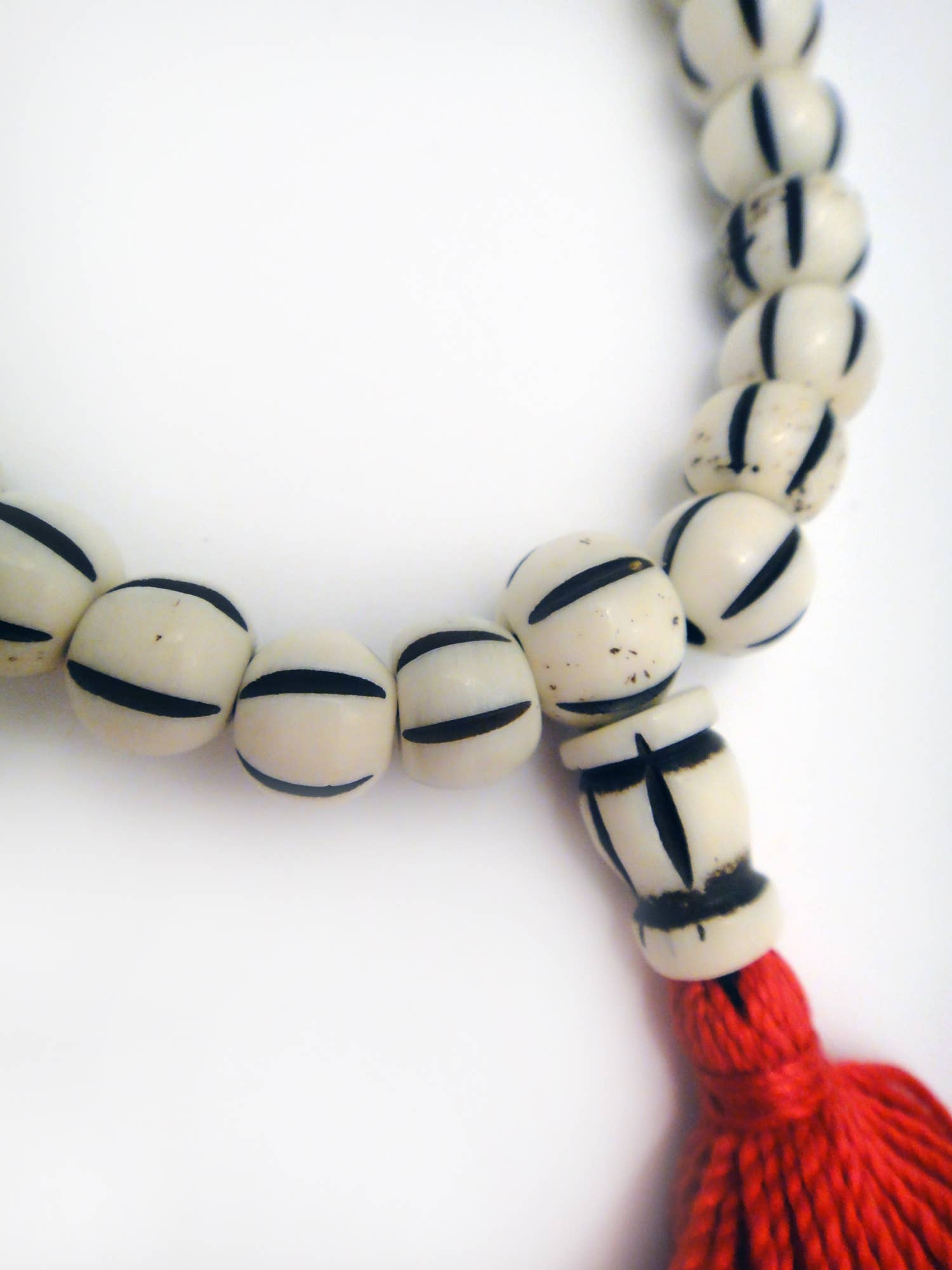 Tika Bracelet Carved Bone Mala Bracelet- Light Striped