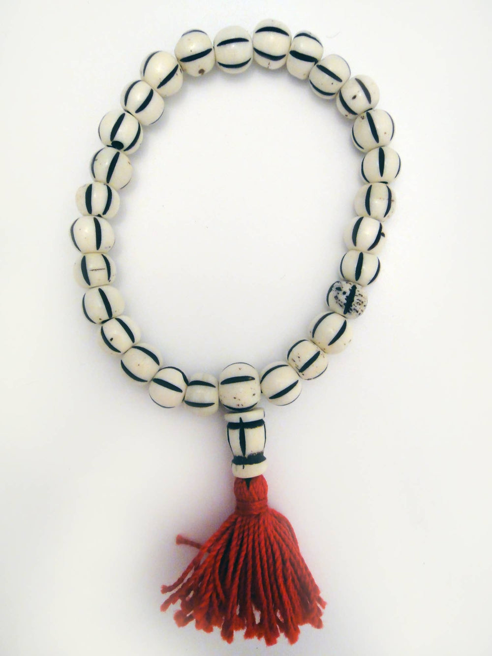 Tika Bracelet Carved Bone Mala Bracelet- Light Striped